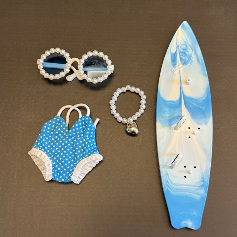 Complete blue Labubu Surfing Outfit set with accessories and surfboard. Designed to fit all Labubu dolls, doll not included.