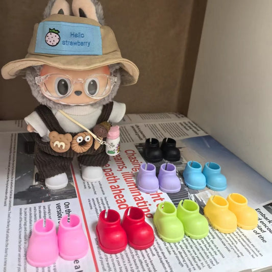 Monster Shoes - Labubu Doll Shoes in assorted colors displayed beside a dressed Labubu doll. Fits dolls, US only.